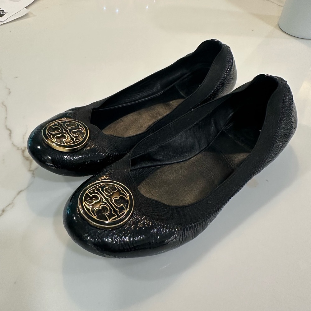 Tory Burch Black Flats with Gold Emblem